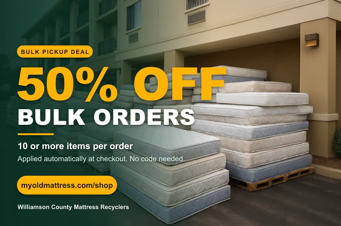 Stacks of old mattresses staged outside an apartment building for bulk recycling pickup in Williamson & Travis Counties, TX, with a 50% off bulk orders offer