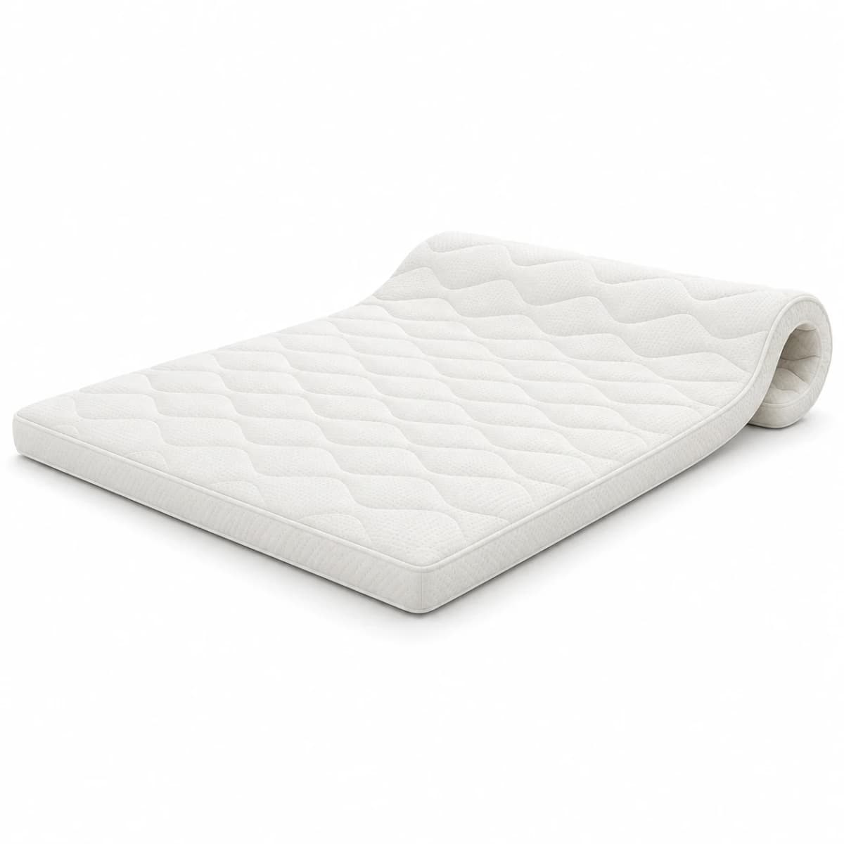A white quilted mattress topper, partly rolled up